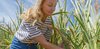 Picture of a woman standing in a field